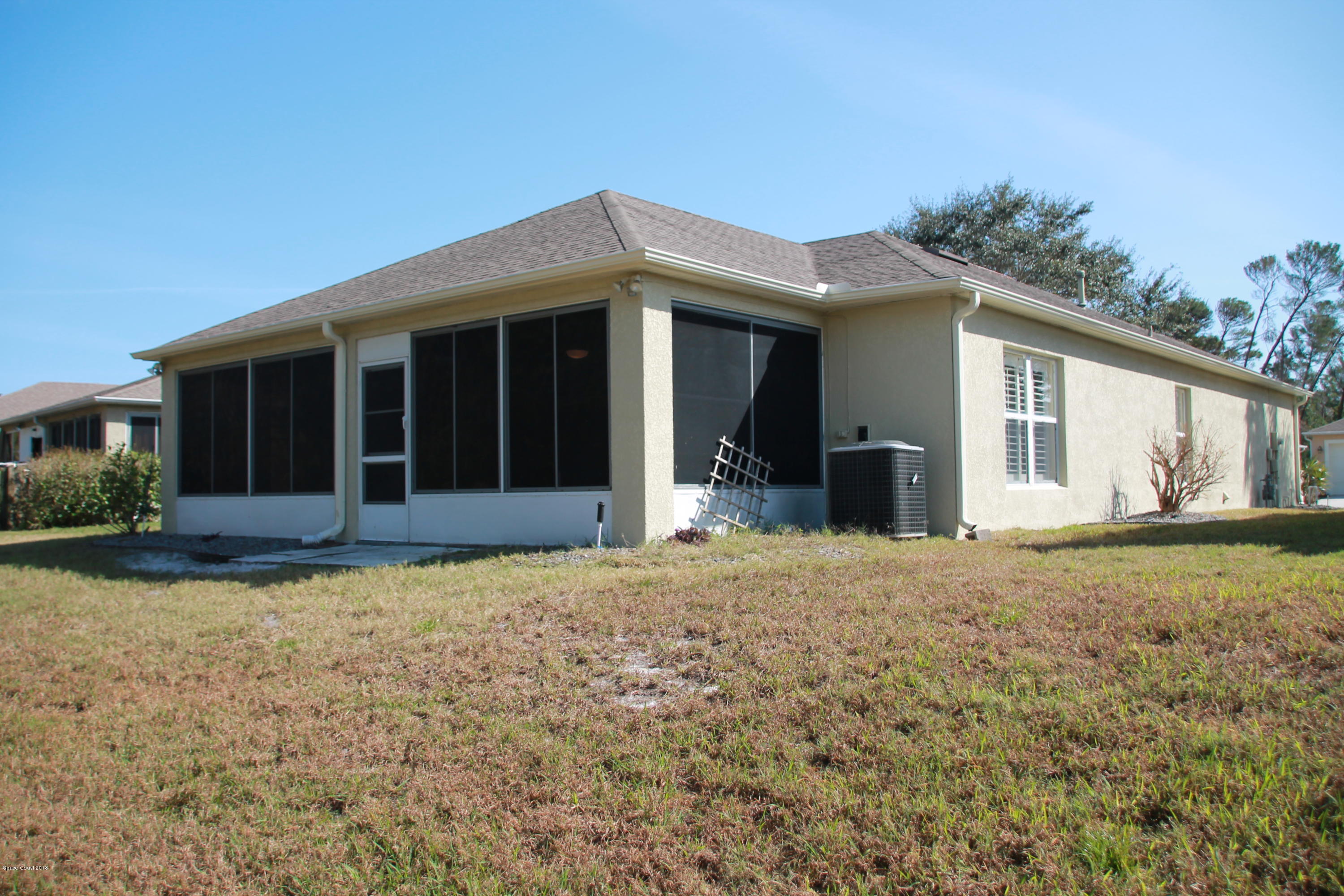 2143 Spring Creek Circle Palm Bay, FL 32905 - Photo 18 of 19 Back View