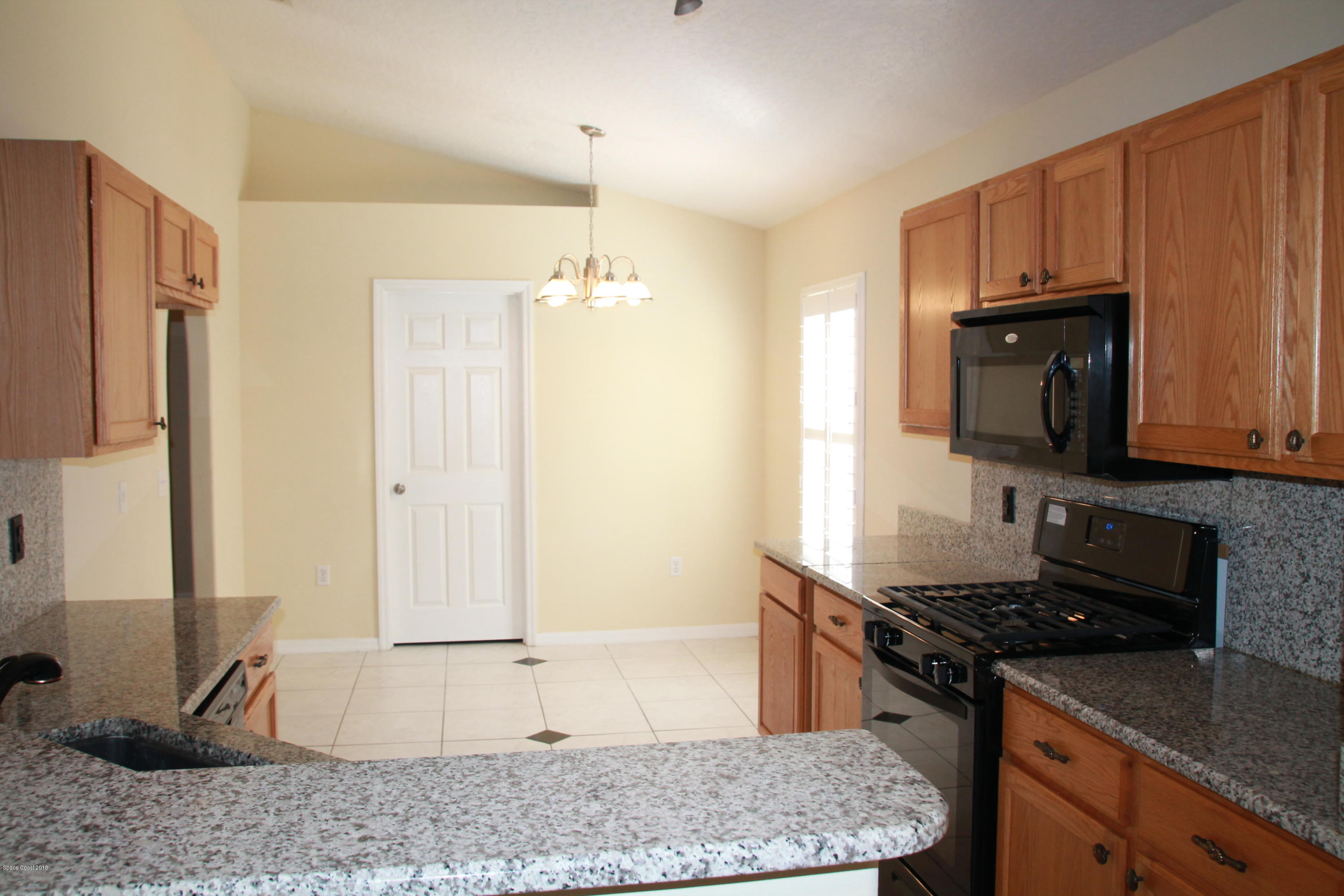 2143 Spring Creek Circle Palm Bay, FL 32905 - Photo 3 of 19 Kitchen View 2