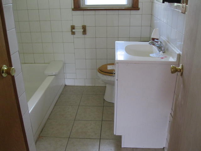2147 Meadowbrook Road Northwest Roanoke, VA 24017 - Photo 15 of 17 a bathroom with a sink and shower