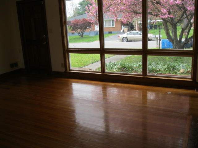 2147 Meadowbrook Road Northwest Roanoke, VA 24017 - Photo 6 of 17 a view of empty room with wooden floor and fan