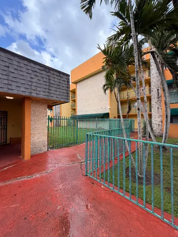 a view of a street with cars