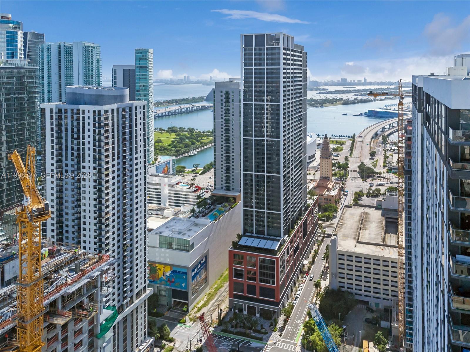 159 Northeast 6th Street, Unit 2403 Miami, FL 33132 - Photo 16 of 16 a city view with tall buildings