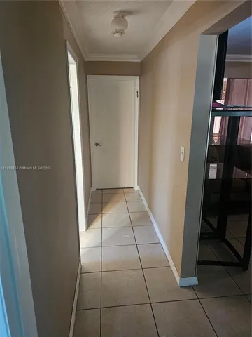 a bathroom with a sink mirror and toilet