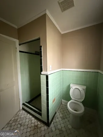 a bathroom with a toilet