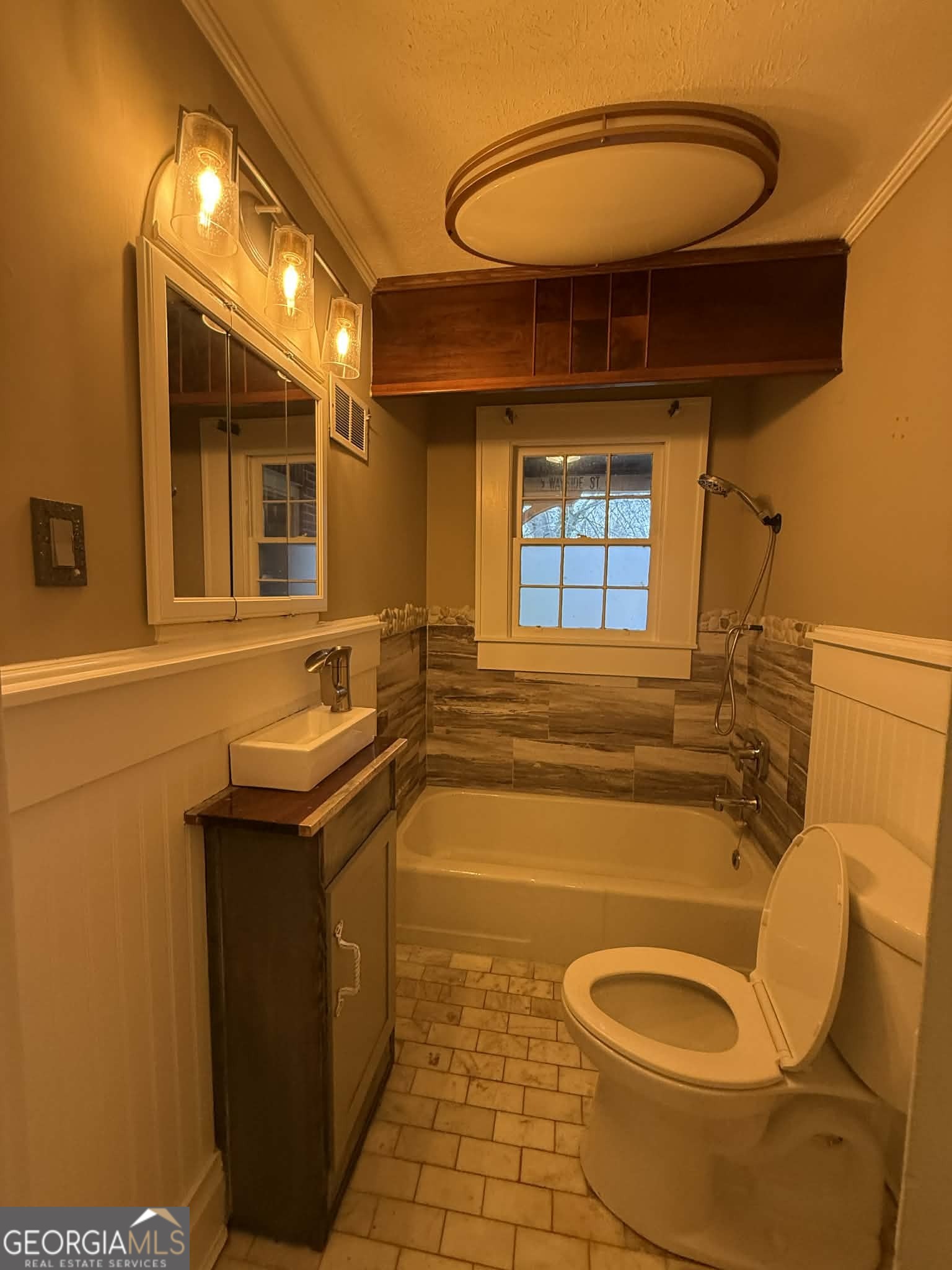 952 Wayside Street Northwest Cornelia, GA 30531 - Photo 31 of 46 a bathroom with a sink and a mirror