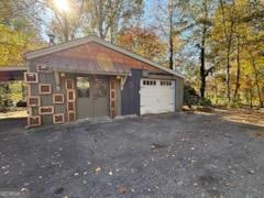 952 Wayside Street Northwest Cornelia, GA 30531 - Photo 41 of 46 a front view of a house with a yard and garage