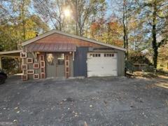 952 Wayside Street Northwest Cornelia, GA 30531 - Photo 42 of 46 a view of a house with a outdoor space and a tree