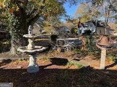 952 Wayside Street Northwest Cornelia, GA 30531 - Photo 45 of 46 a view of a fire pit with large trees