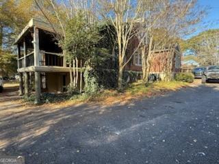 952 Wayside Street Northwest Cornelia, GA 30531 - Photo 46 of 46 a view of a house with a yard and garage