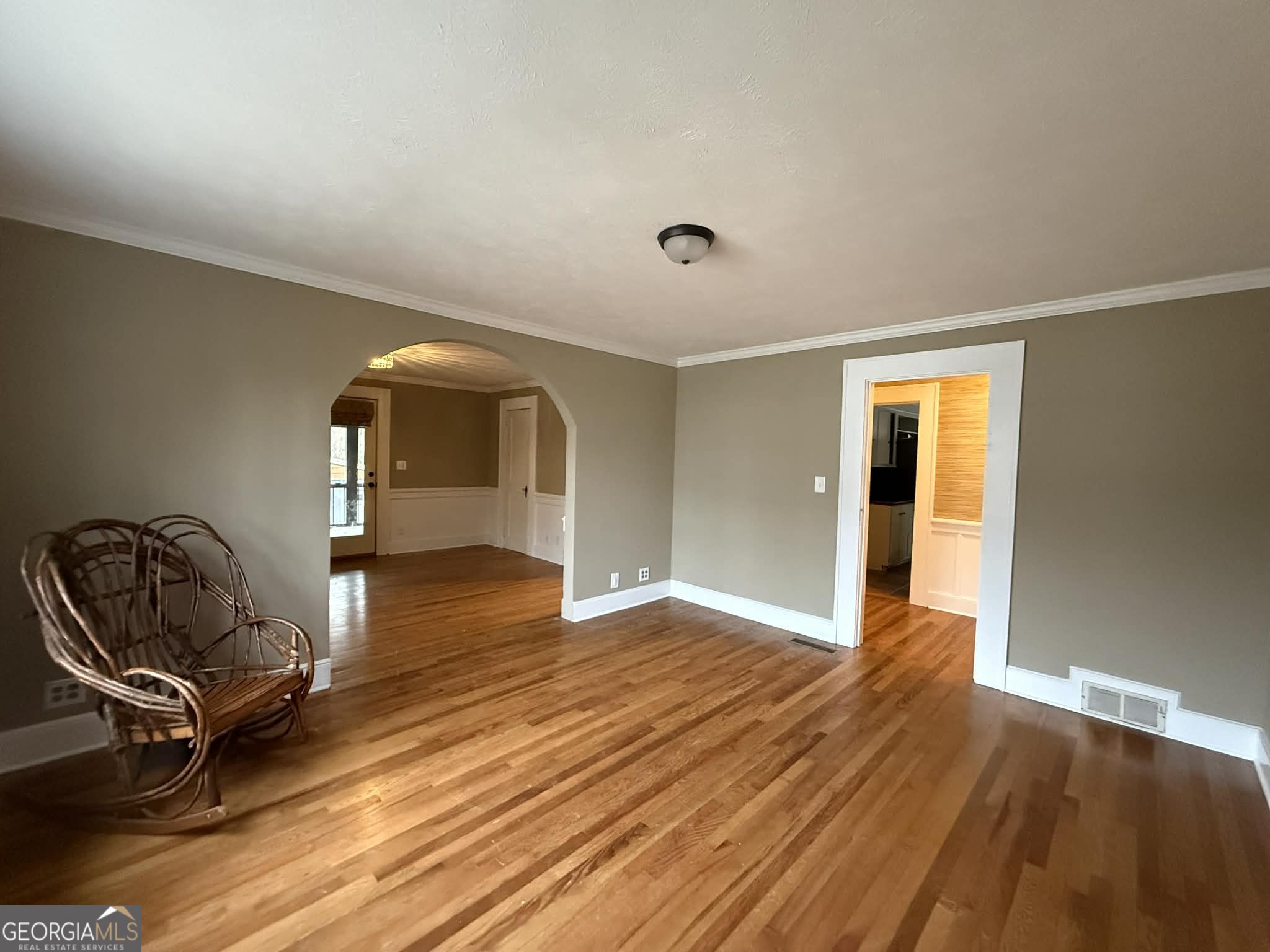 952 Wayside Street Northwest Cornelia, GA 30531 - Photo 8 of 46 a view of a room with wooden floor lounge chair and windows
