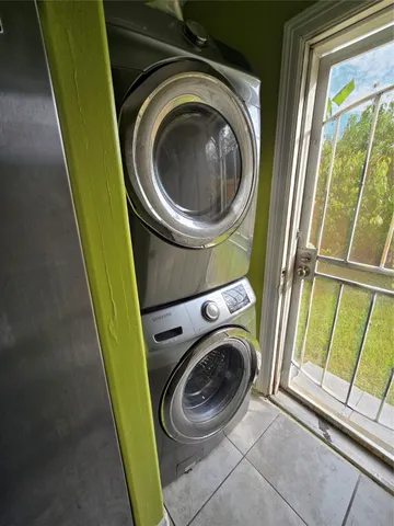 a view of washer and dryer in a bathroom