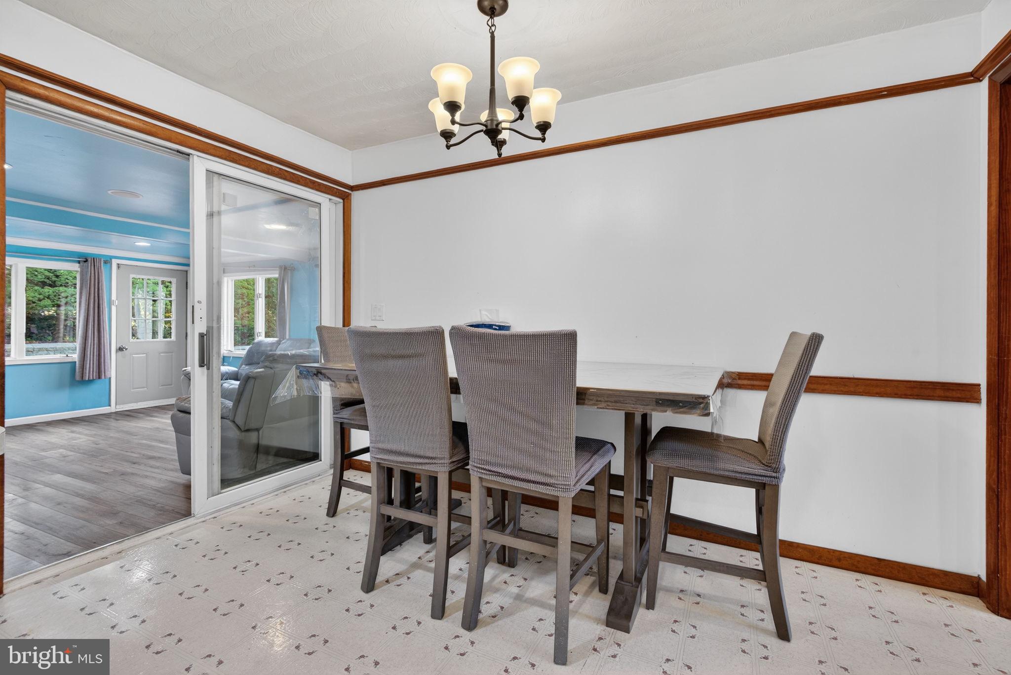 2210 Berkshire Road Lancaster, PA 17603 - Photo 16 of 68 a view of a dining room with furniture and wooden floor