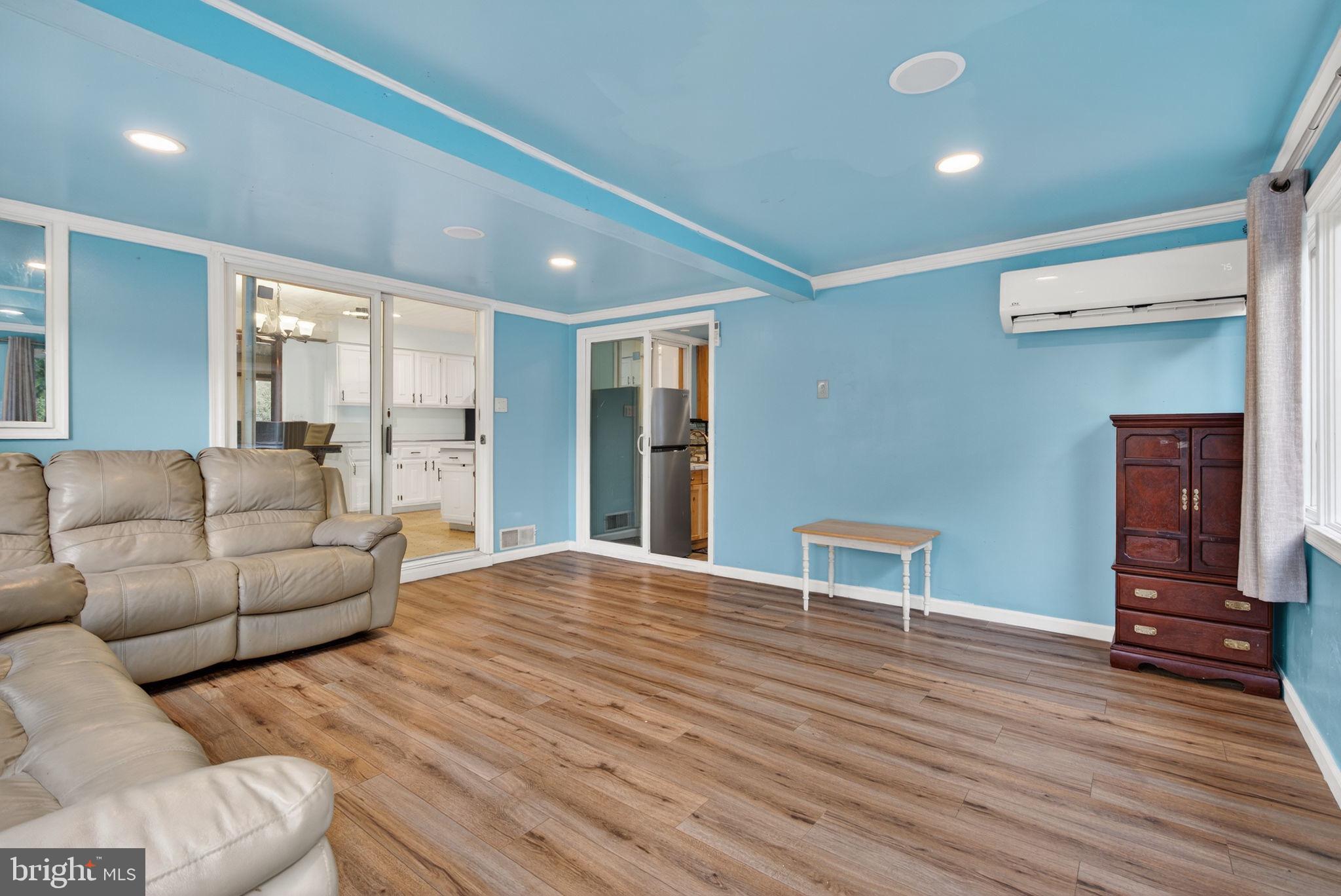 2210 Berkshire Road Lancaster, PA 17603 - Photo 21 of 68 a living room with furniture and wooden floor