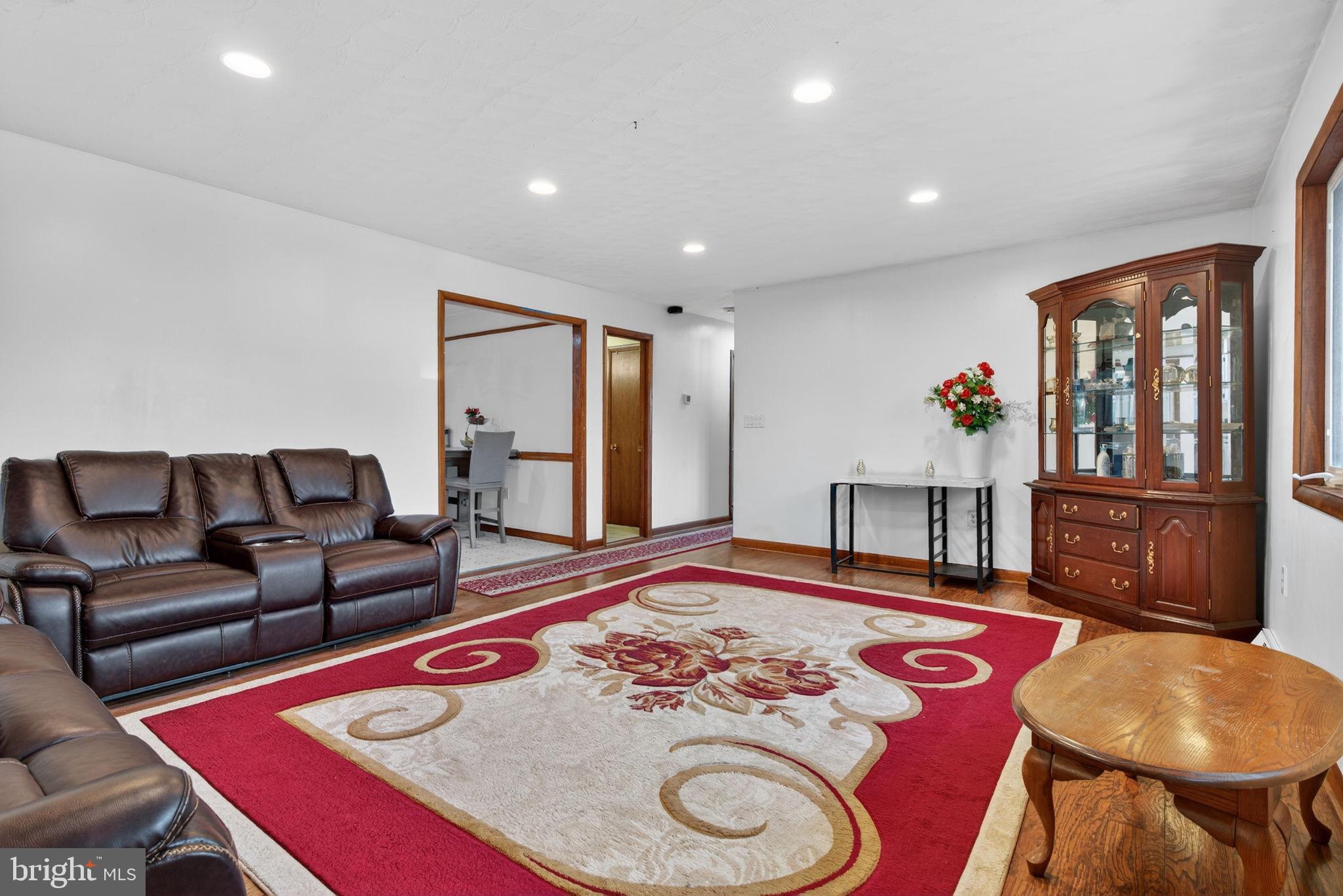 2210 Berkshire Road Lancaster, PA 17603 - Photo 25 of 68 a living room with furniture and wooden floor
