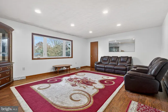 a bedroom with a bed and a table in it