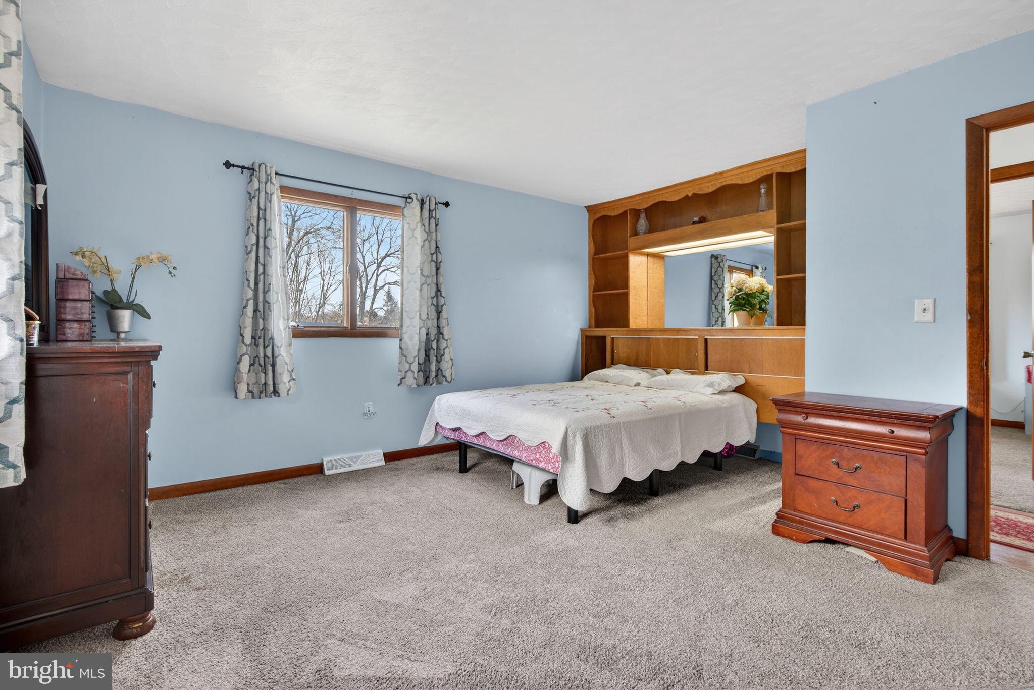 2210 Berkshire Road Lancaster, PA 17603 - Photo 31 of 68 a bedroom with a bed and a dresser