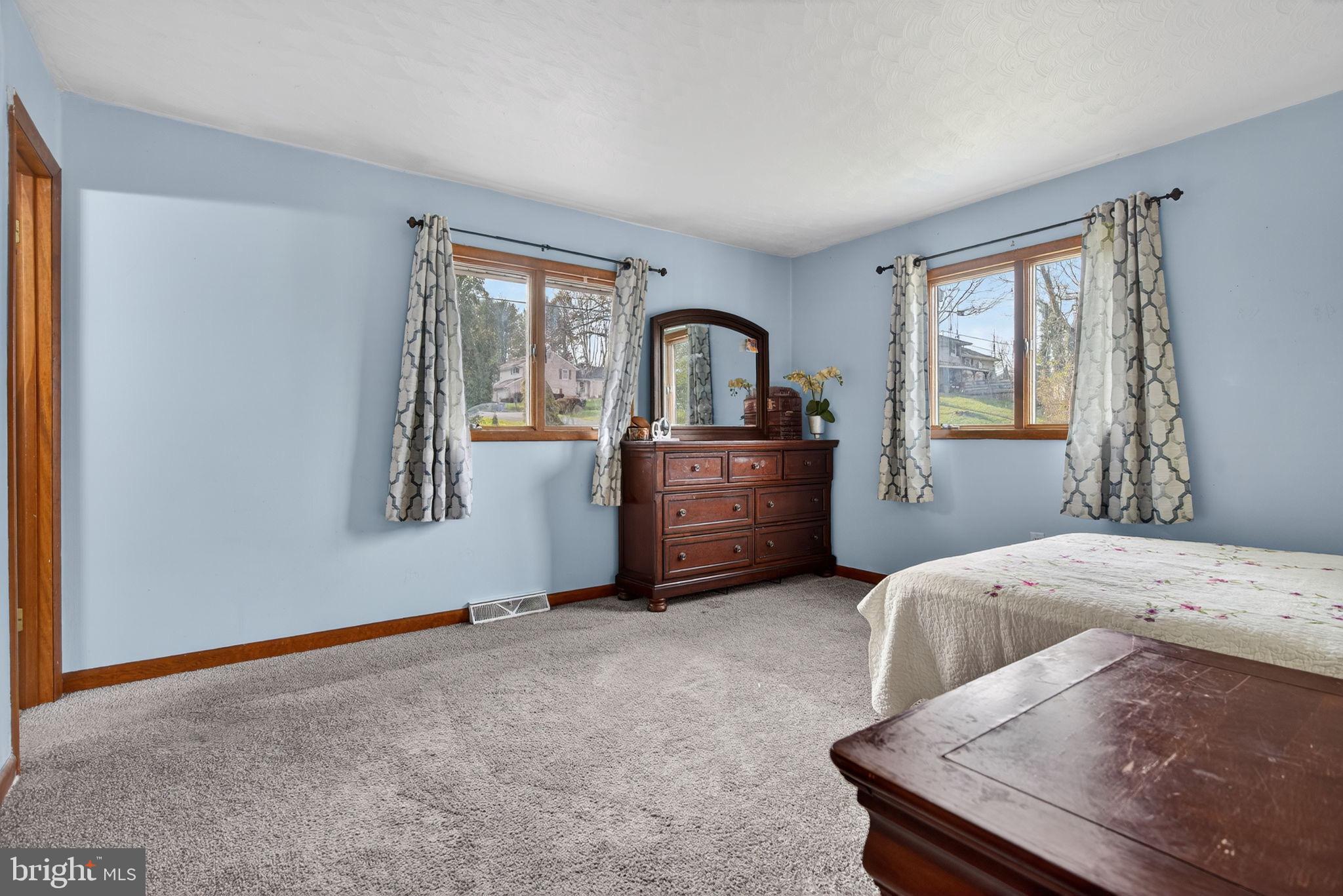 2210 Berkshire Road Lancaster, PA 17603 - Photo 37 of 68 Serene blue bedroom with natural light.