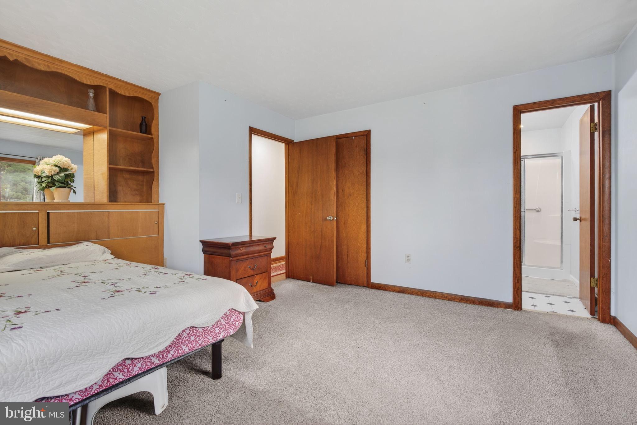2210 Berkshire Road Lancaster, PA 17603 - Photo 38 of 68 a bedroom with a bed and a dresser next to it