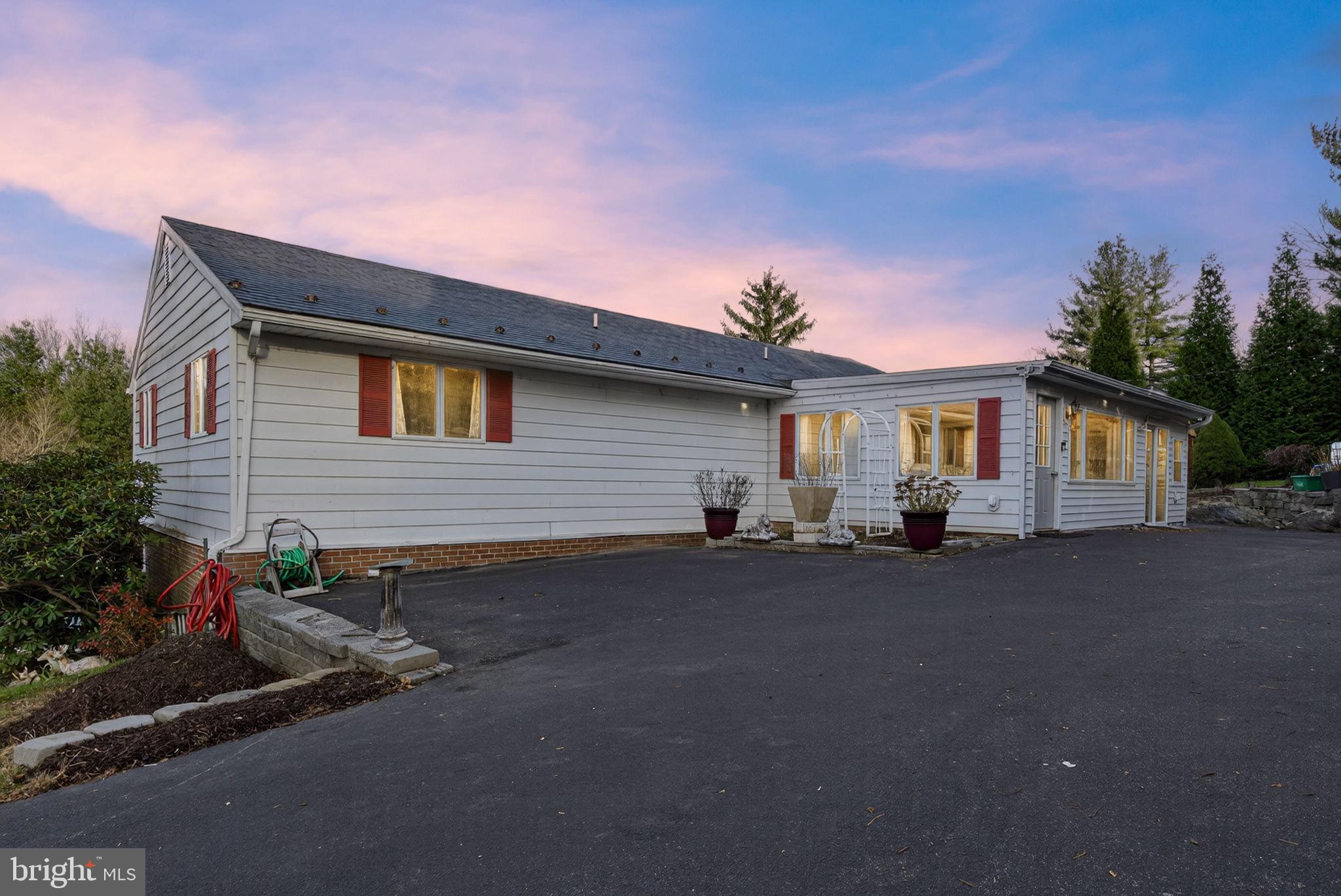 2210 Berkshire Road Lancaster, PA 17603 - Photo 4 of 68 a view of a house with backyard and sitting area