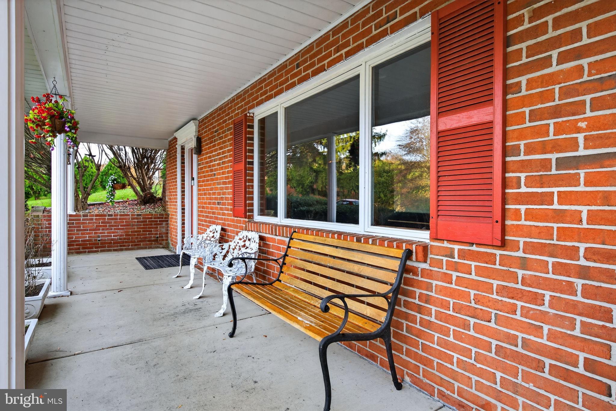 2210 Berkshire Road Lancaster, PA 17603 - Photo 46 of 68 a bench sitting in front of a house