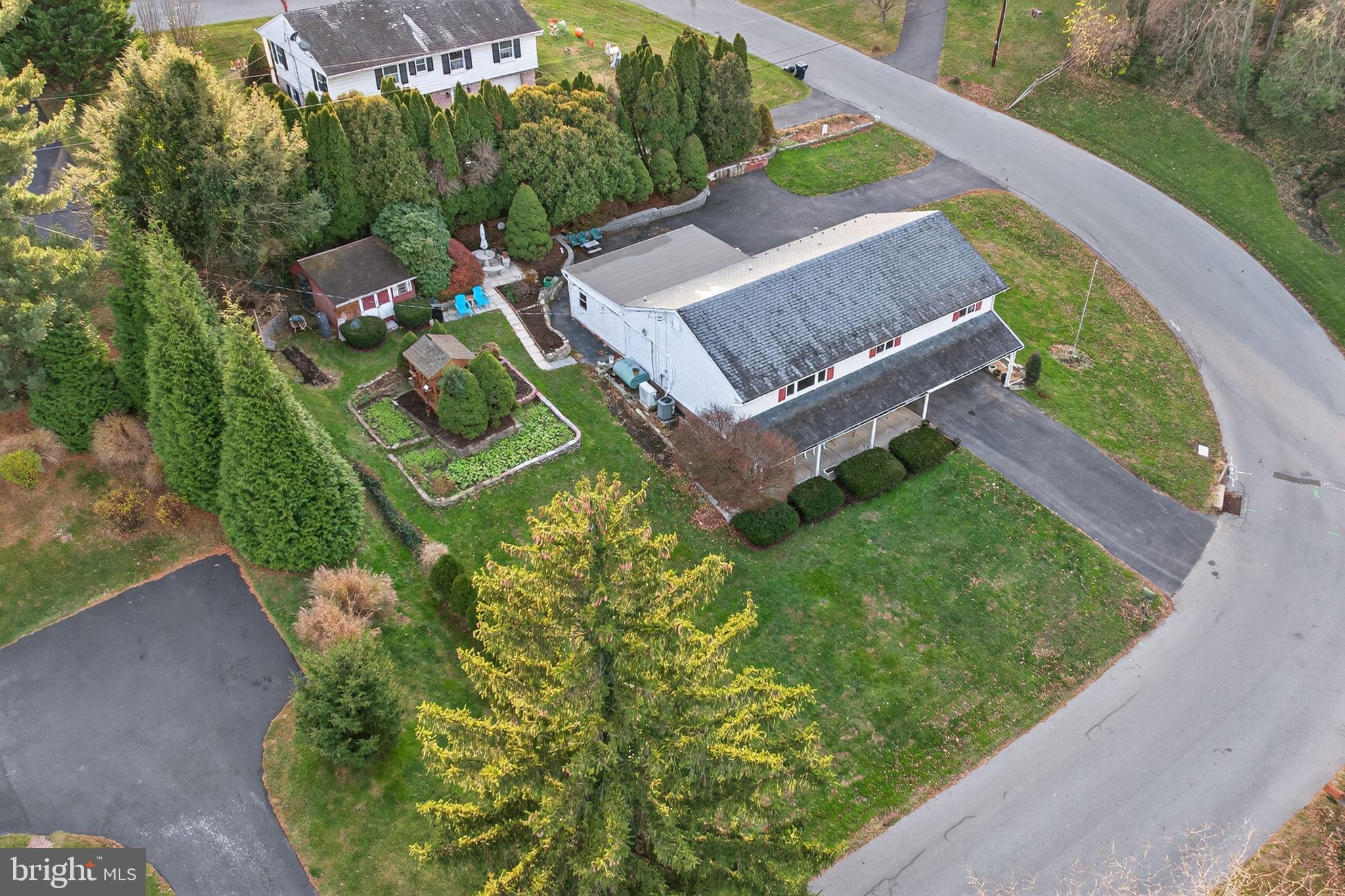 2210 Berkshire Road Lancaster, PA 17603 - Photo 58 of 68 Charming home nestled in lush greenery.
