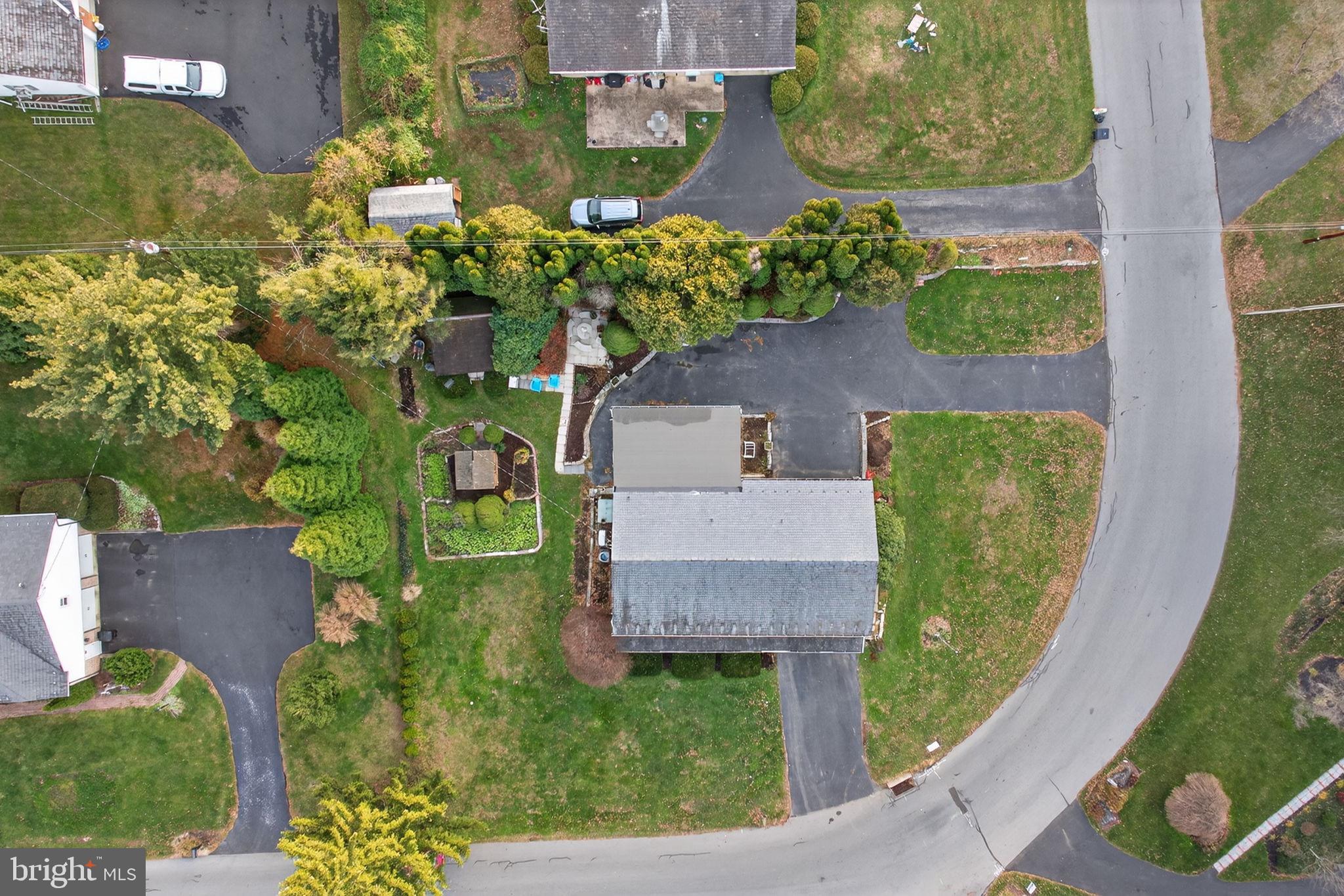 2210 Berkshire Road Lancaster, PA 17603 - Photo 61 of 68 an aerial view of a house with a yard and a fountain
