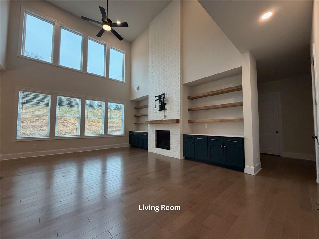 3770 Andover Street Cumming, GA 30028 - Photo 14 of 52 a view of an empty room with a window and fireplace