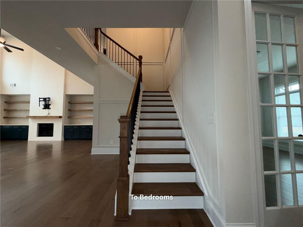 3770 Andover Street Cumming, GA 30028 - Photo 21 of 52 a view of entryway and hall with wooden floor