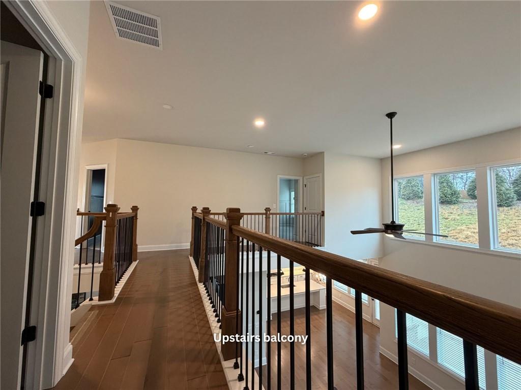 3770 Andover Street Cumming, GA 30028 - Photo 23 of 52 a view of a hallway with windows