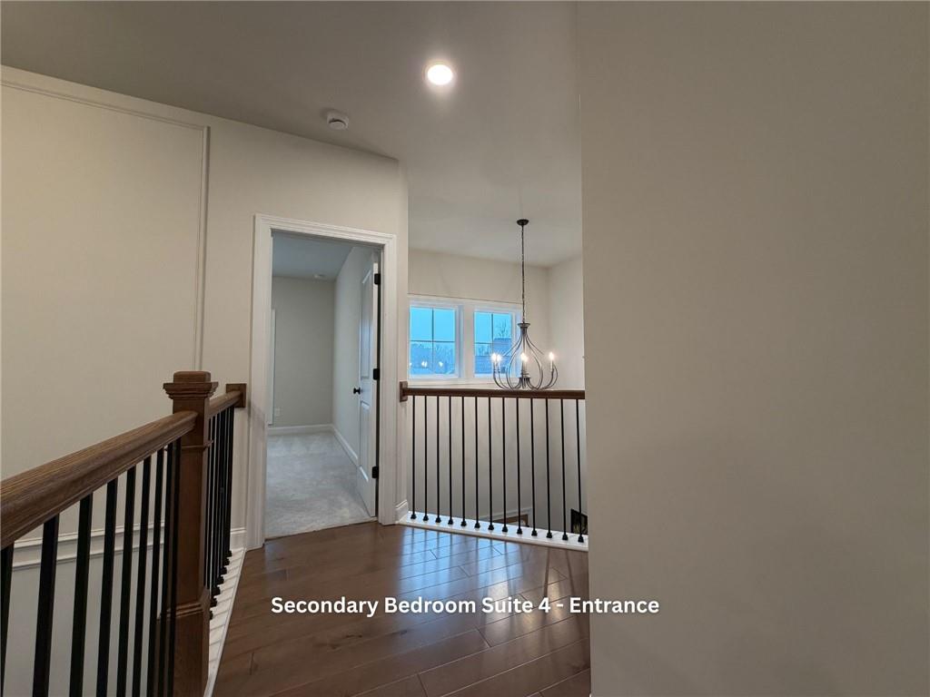 3770 Andover Street Cumming, GA 30028 - Photo 39 of 52 a view of a hallway with wooden floor windows