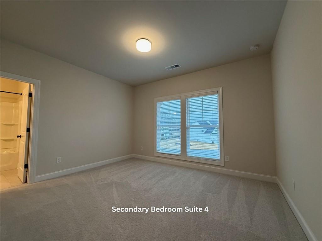 3770 Andover Street Cumming, GA 30028 - Photo 41 of 52 an empty room with windows