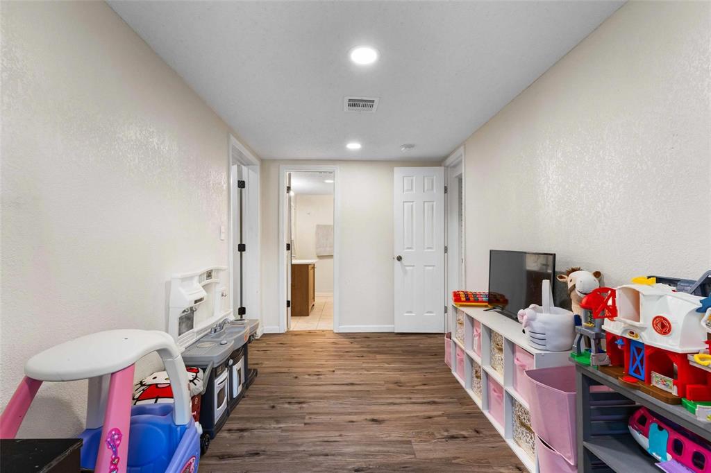 1126 West 7th Street McGregor, TX 76657 - Photo 22 of 33 a bed room with a bed and a window