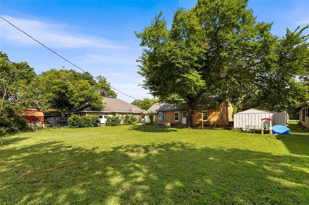 1126 West 7th Street McGregor, TX 76657 - Photo 26 of 33 a view of a house with a big yard