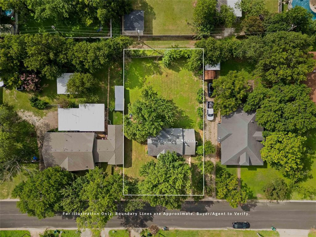 1126 West 7th Street McGregor, TX 76657 - Photo 31 of 33 an aerial view of a house with a yard and lake view
