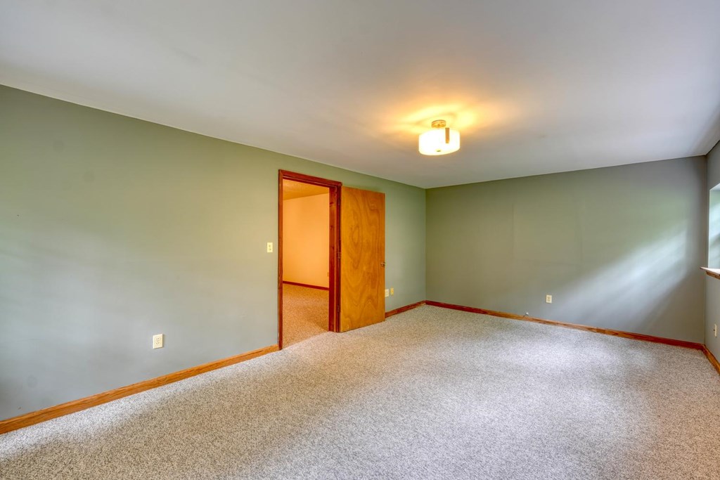 1066 Ridge Road Hiawassee, GA 30546 - Photo 26 of 51 a view of an empty room with a window