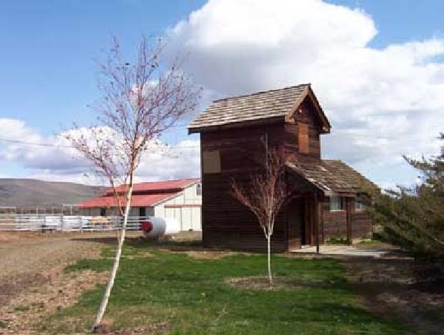 2762 Cook Road Yakima, WA 98908 - Photo 4 of 7 a view of a house with a yard