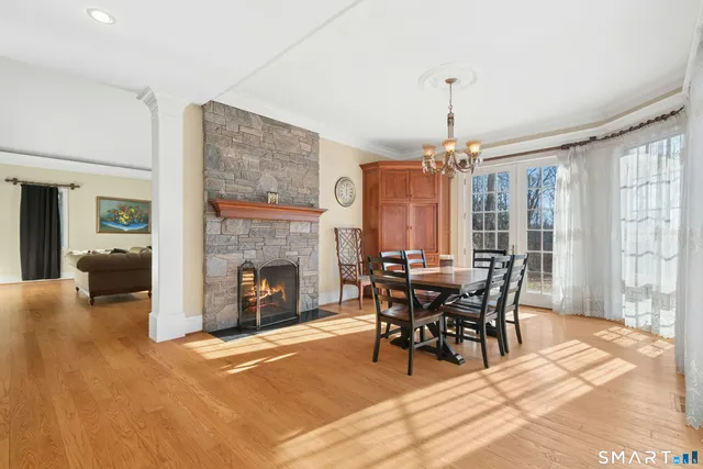 a view of a dining room with furniture window and outside view