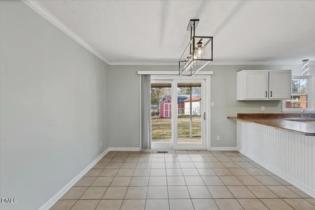 a view of an empty room and window