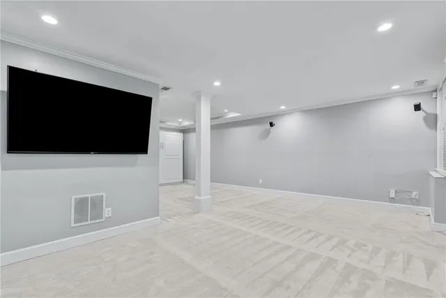 a view of a garden with trees in front of a house