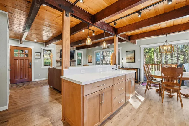 a kitchen with a stove and a sink