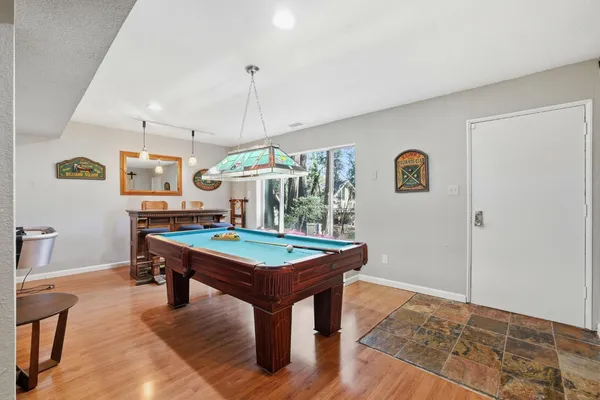 a view of a wooden deck with furniture