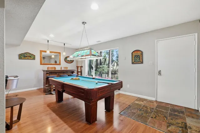 a view of a wooden deck with furniture