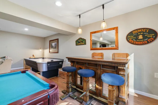 a view of a park with large trees