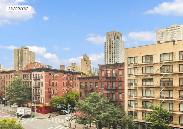 a city view with tall buildings