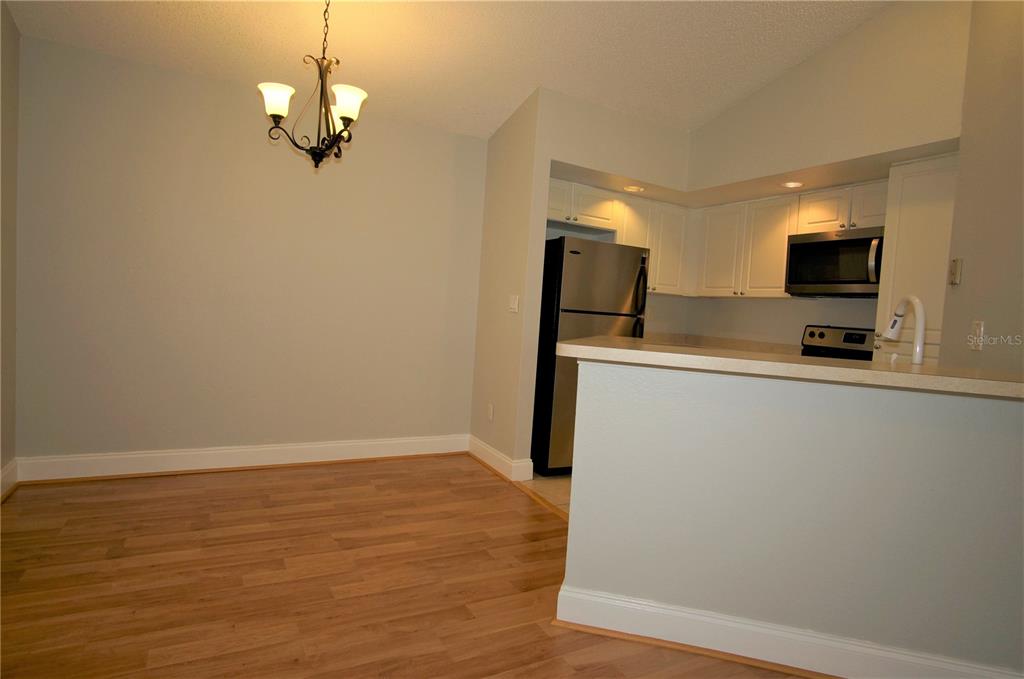 4572 Commander Drive, Unit 1237 Orlando, FL 32822 - Photo 19 of 31 a view of a kitchen with a sink