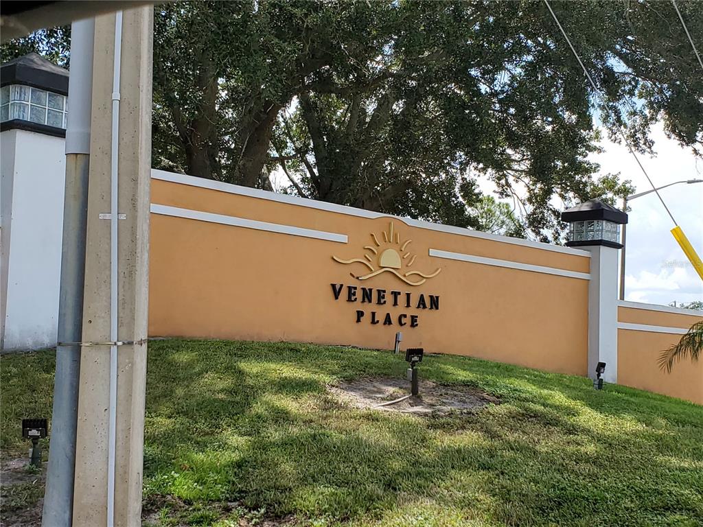 4572 Commander Drive, Unit 1237 Orlando, FL 32822 - Photo 31 of 31 a sign that is sitting in front of a house