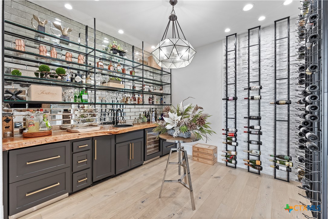 19102 Post Oak Road Bartlett, TX 76511 - Photo 12 of 43 a very nice looking room with a large window and chandelier