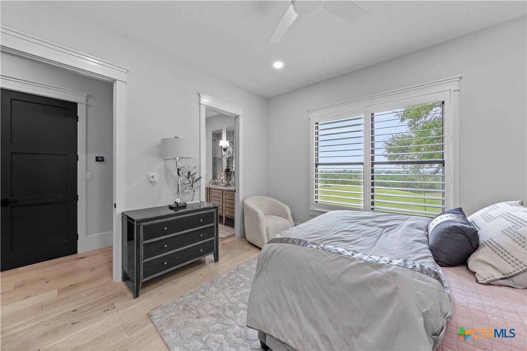 19102 Post Oak Road Bartlett, TX 76511 - Photo 16 of 43 a bedroom with a bed and a dresser