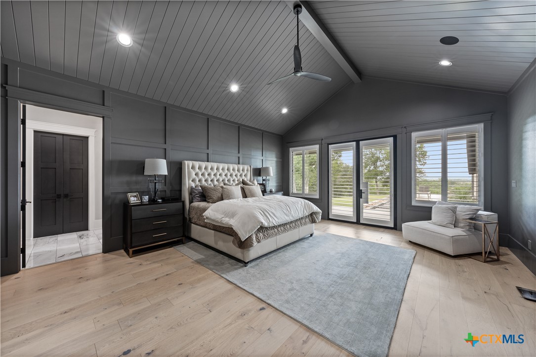 19102 Post Oak Road Bartlett, TX 76511 - Photo 18 of 43 a spacious bedroom with a large bed and a couch