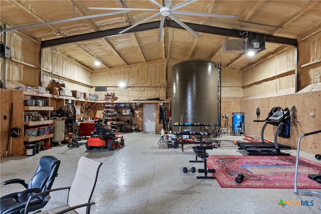 19102 Post Oak Road Bartlett, TX 76511 - Photo 30 of 43 a view of a room with gym equipment